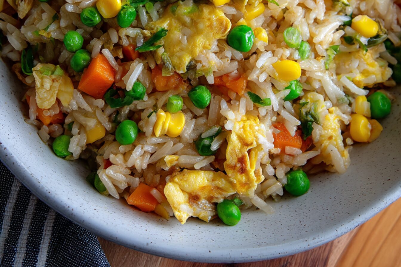 This quick and easy Vegetable Fried Rice is the perfect budget-friendly meal! Made with leftover rice, frozen veggies, and eggs, it comes together in just 15 minutes. It's filling, customizable, and a great way to cut food waste while packing in flavor and nutrients.